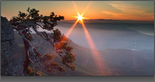 Image of a beautiful sunset across a valley